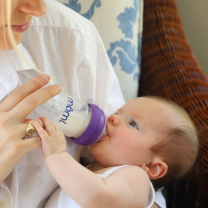 Mōmi on-the-go bundle 4oz baby bottles, angled view showcasing sleek design and portability for feeding convenience.