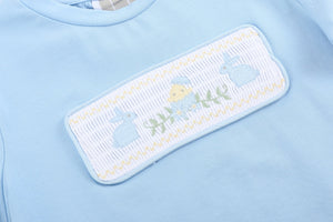 Light blue Easter smocked t-shirt and shorts set for babies, angle view showcasing playful design and comfortable fit.