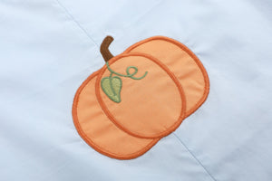 Light blue pumpkin applique overalls for babies, showcased at angle 4. Perfect for fall fashion!