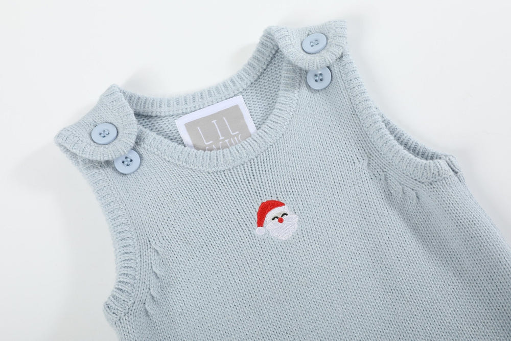 Light blue Santa knit romper for babies, perfect for festive occasions and cozy winter wear.