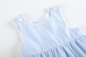 Light blue seersucker A-line dress for babies, shown at angle 3, perfect for summer outings and special occasions.