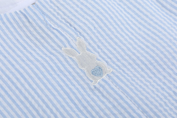 Light blue seersucker Easter bunny overalls for babies, shown from angle 3, perfect for spring celebrations.