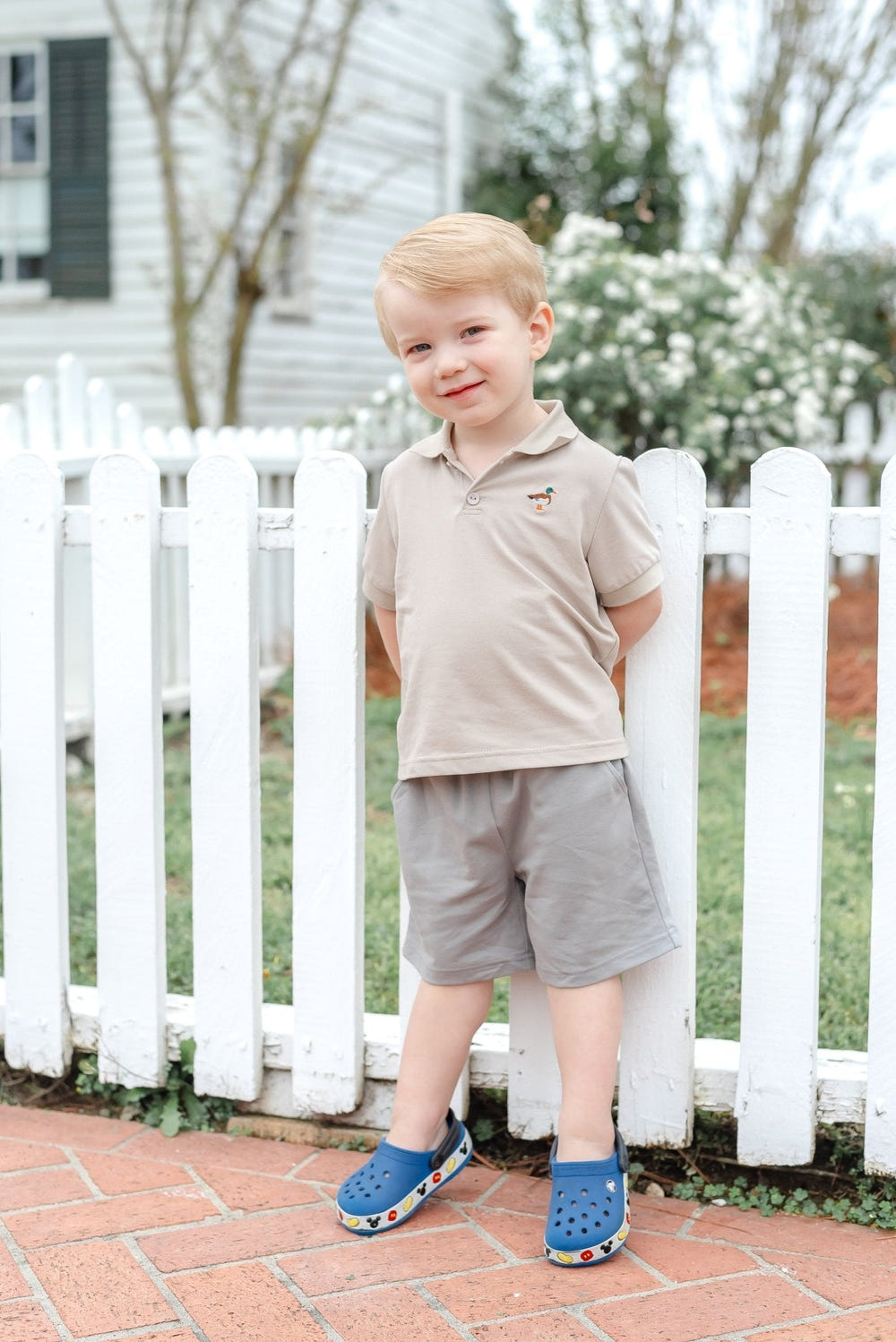 Light brown mallard golf polo shirt for babies, perfect for stylish outdoor play.