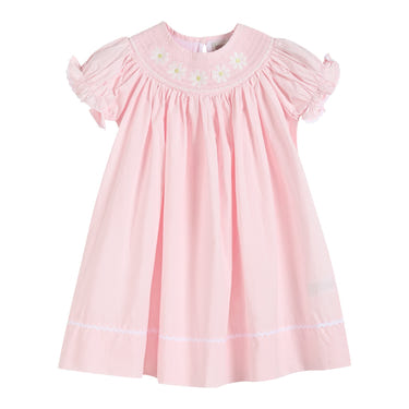 Light pink daisy smocked bishop dress for babies, perfect for special occasions and everyday wear.