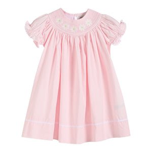 Light pink daisy smocked bishop dress for babies, perfect for special occasions and everyday wear.