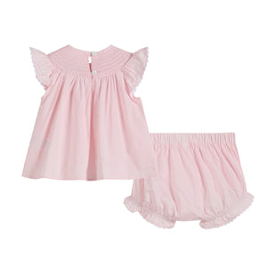 Light pink daisy smocked top and bloomer 2 pc set for babies, angle view showcasing cute design and comfortable fit.