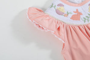 Light pink Easter smocked flutter romper for babies, showcasing a cute design from angle 5. Perfect for spring outfits.