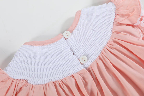 Light pink Easter smocked flutter romper for babies, shown from angle 3, perfect for spring celebrations.