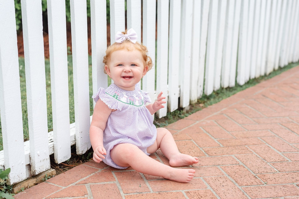 Light purple seersucker bunny smocked romper for babies, perfect for stylish and comfortable playtime.