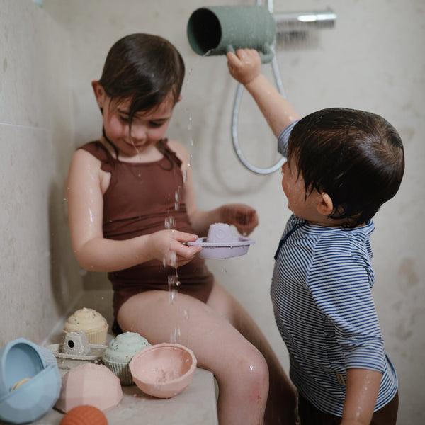 Colorful baby bath rinse cup at a 15-degree angle, perfect for gentle rinsing during bath time.