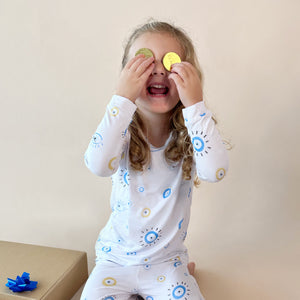 Toddler Pajama Set in Eye See You design, showcasing playful patterns and cozy fit from angle 3.