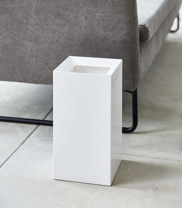 "Stylish baby trash can for nursery, perfect for easy waste disposal and maintaining a clean environment."