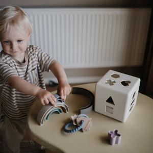 Colorful Rainbow Stacker Toy for babies, promoting motor skills and creativity, viewed from angle 13.