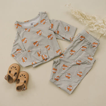 Mama Tattoo Hearts 2pc Bamboo Pajamas for babies, soft and cozy sleepwear in a charming heart design.