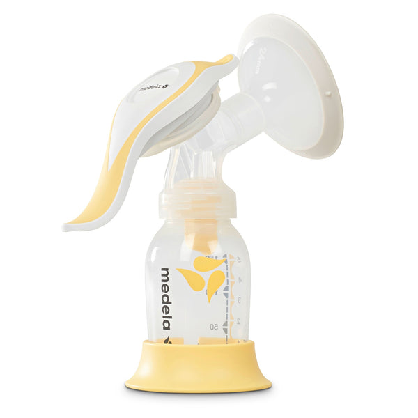 Medela Harmony Manual Breast Pump at an angle, designed for comfortable and efficient breastfeeding support.