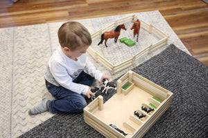 Amish-made wooden mini stockyard toy with 7 stalls, perfect for imaginative farming play.