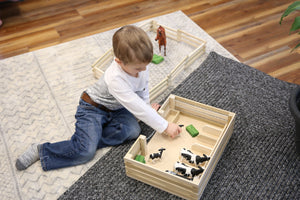 Amish-made wooden mini stockyard toy with 7 stalls, perfect for imaginative farming play.