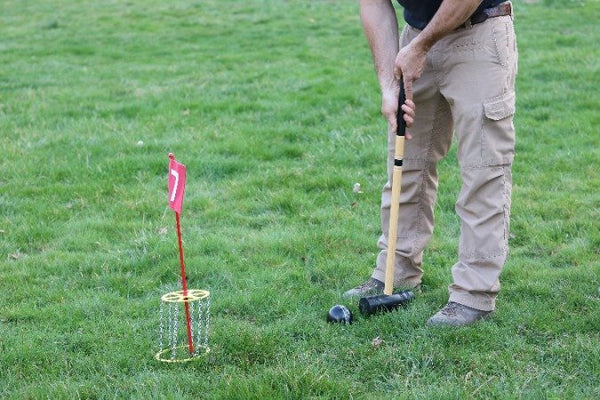 Amish-made Deluxe Flag Croquet Golf Game Set in duffel bag, perfect for outdoor sports and family fun.