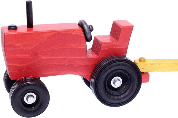 Amish-made wooden toy tractor and wagon set with hay bales, showcasing craftsmanship and fun for kids.