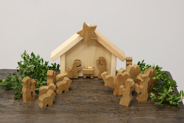 Wooden Nativity Manger Scene Set, 14 pieces from AmishToyBox.com, showcasing a charming angle 3 view.