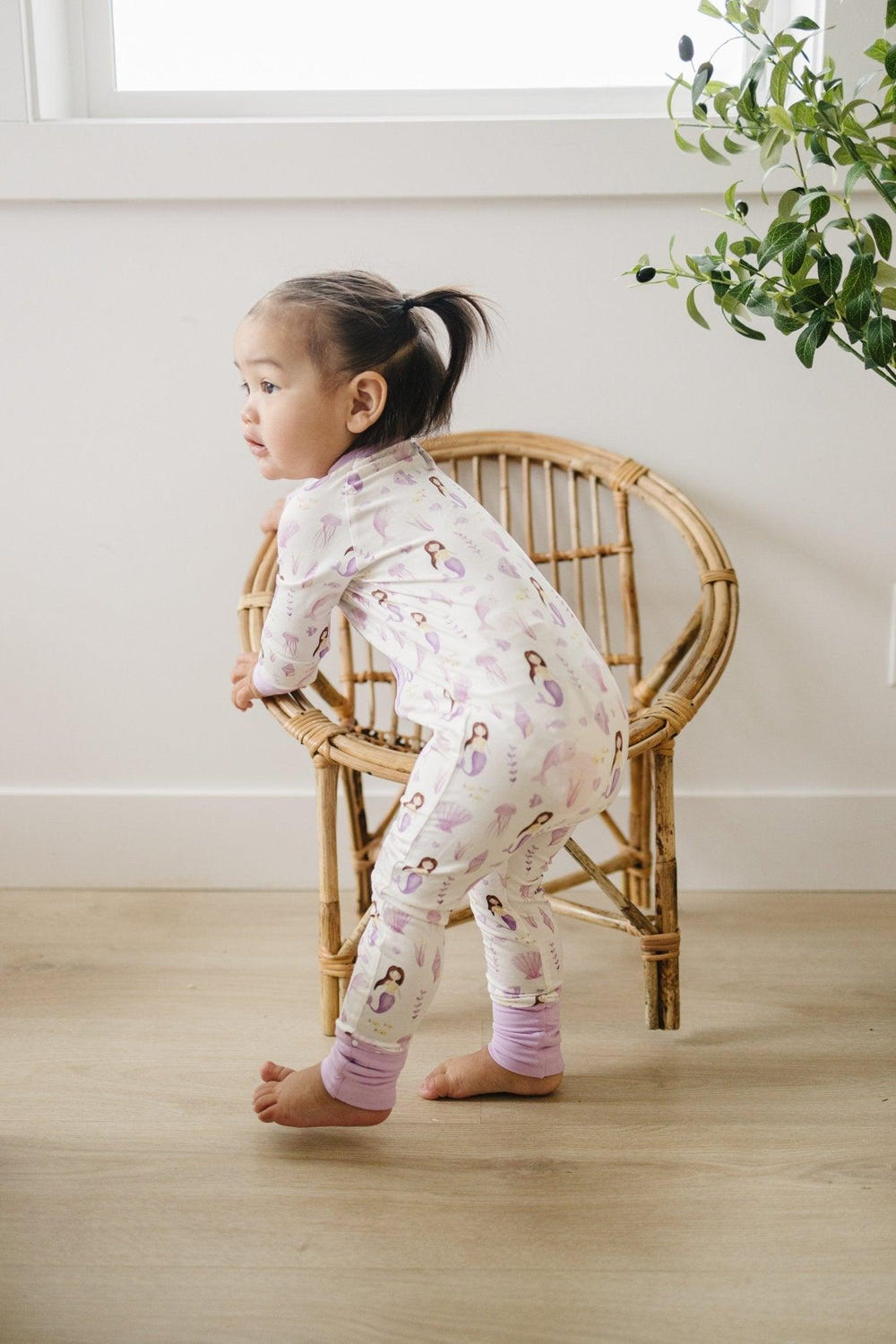 Mia's Mermaids Bamboo Zippy Romper for babies, featuring a colorful mermaid design and soft, eco-friendly fabric.