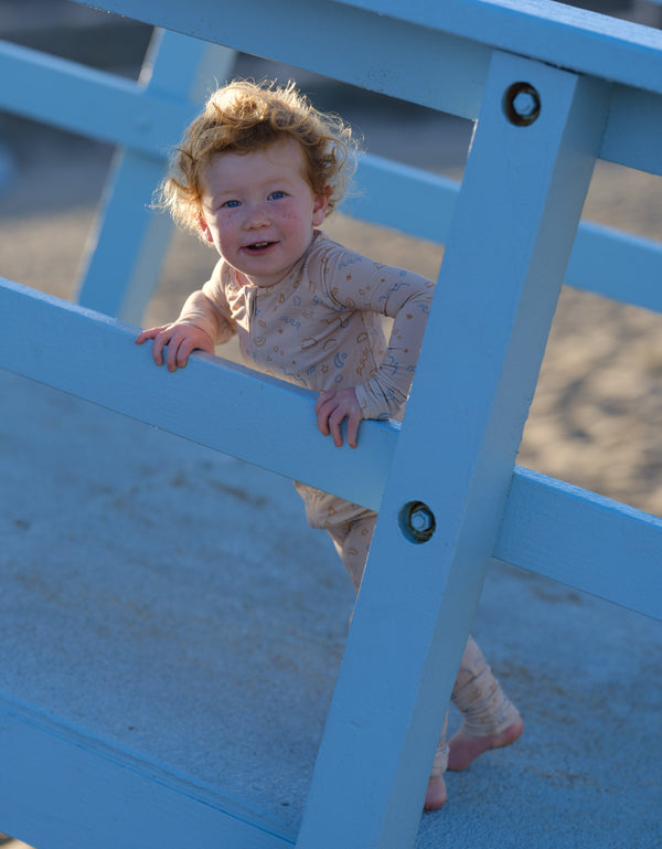 Shwally Romper for babies, stylish and comfortable, shown from angle 9. Perfect for playtime and everyday wear.