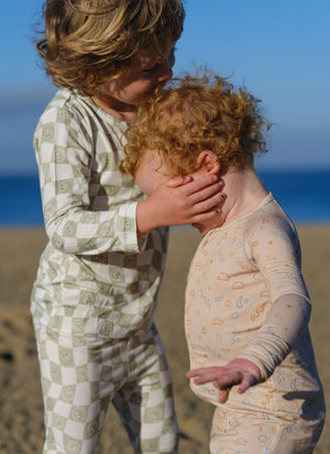 Shwally Romper for babies, stylish and comfortable, shown from angle 7. Perfect for playtime and everyday wear.