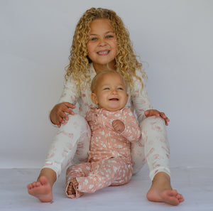 Baby Shwally Romper in playful design, angled view showcasing soft fabric and vibrant colors for stylish comfort.