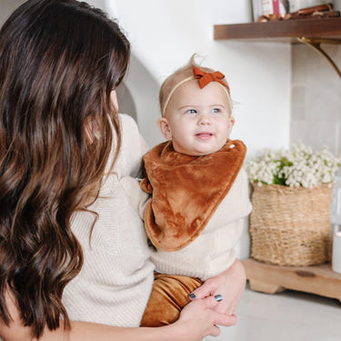 Minky Bibs 3-Pack for babies in soft, colorful designs, perfect for mealtime messes.