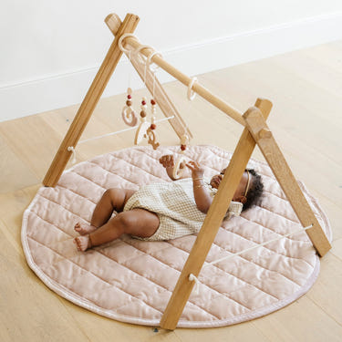 Soft Minky play mat for babies, perfect for tummy time and play, featuring vibrant colors and plush texture.