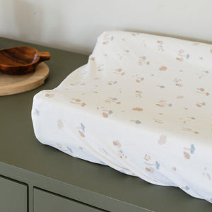 Minky Stretch Luxe Changing Covers in playful design for babies, perfect for comfort during diaper changes.