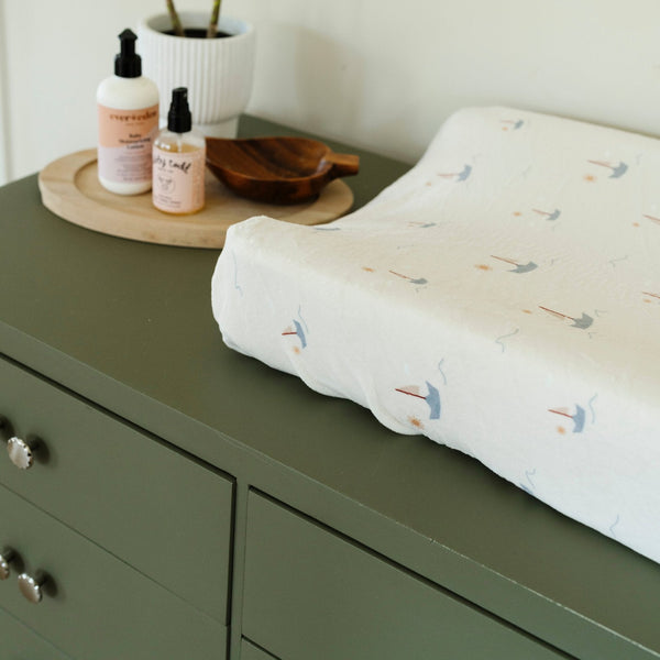 Minky Stretch Luxe Changing Covers for babies, soft and stylish, angled view showcasing vibrant colors and textures.