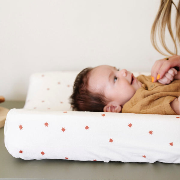 Minky Stretch Luxe Changing Covers in playful colors for baby comfort and style during diaper changes.