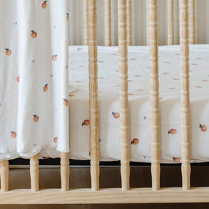 Minky Stretch Luxe Crib Sheets in soft fabric, angled view showcasing stylish design and comfort for babies.