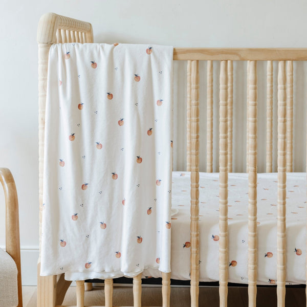 Minky Stretch Luxe Swaddle Blanket in soft fabric, perfect for keeping your baby cozy and comfortable.