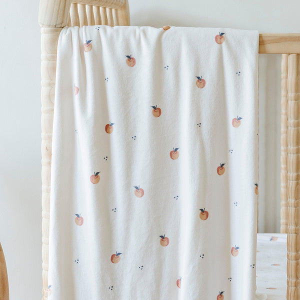 Minky Stretch Luxe Swaddle Blanket in soft fabric, perfect for keeping babies cozy and comfortable.