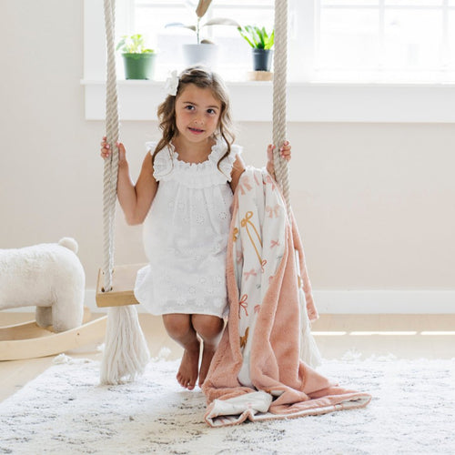 Minky/Lush toddler blanket in soft fabric, showcasing cozy design from angle 2. Perfect for snuggling and warmth.