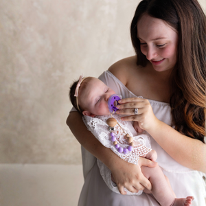 mōmi babypace® breast-like pacifier in multiple vibrant colors