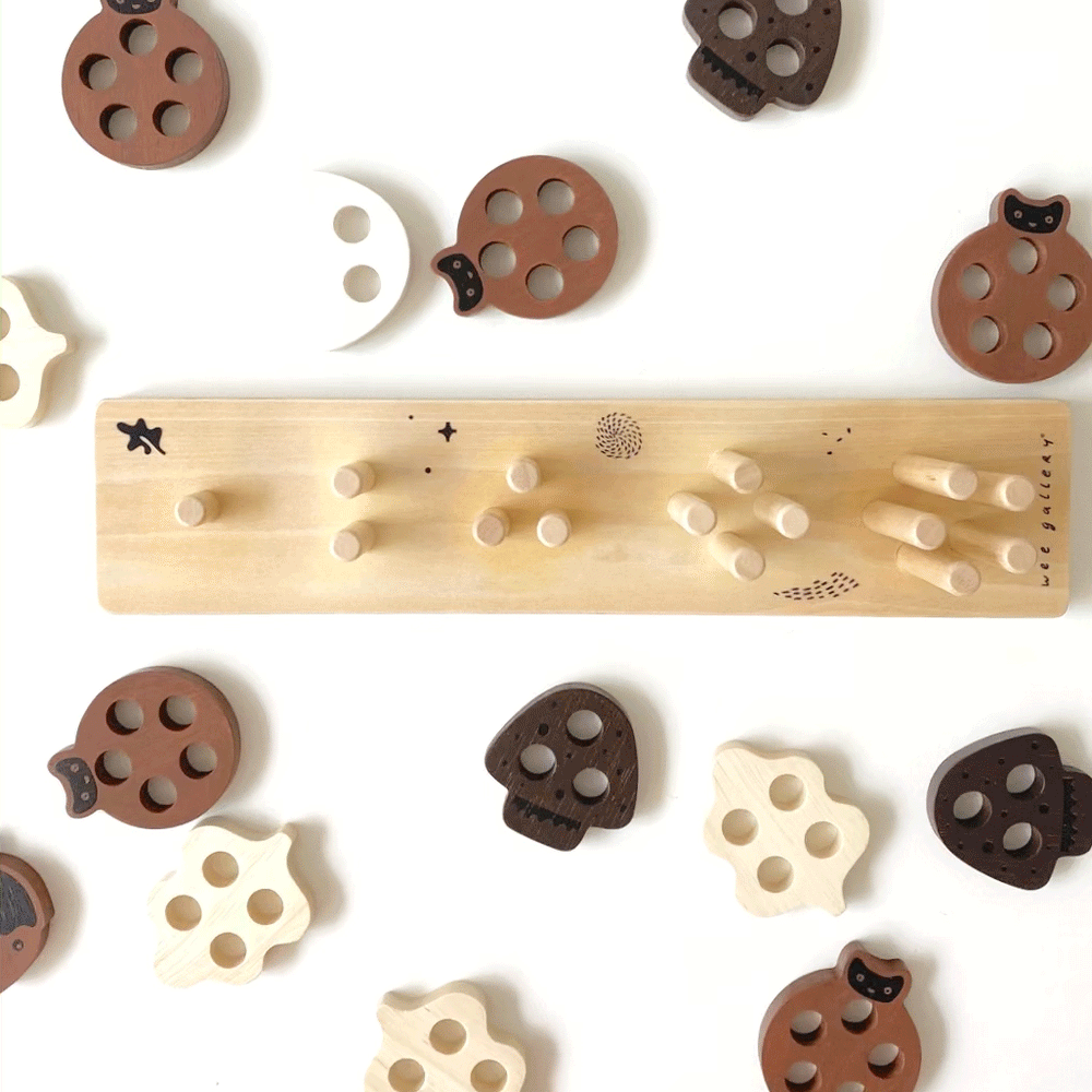 Colorful wooden Count and Stack Toy for babies, promoting early learning and motor skills development.