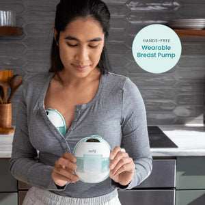 Motif Aura Glow wearable breast pump in angle 5 view, showcasing its sleek design and portability for nursing mothers.