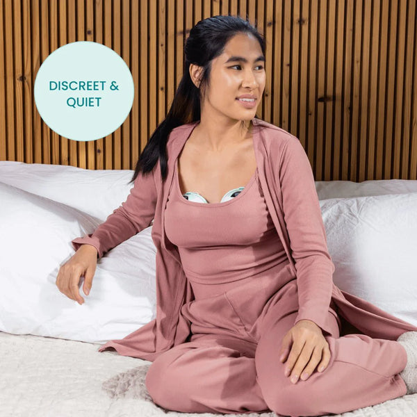 Motif Aura Glow Wearable Breast Pump at angle 8, showcasing its sleek design and portability for breastfeeding moms.