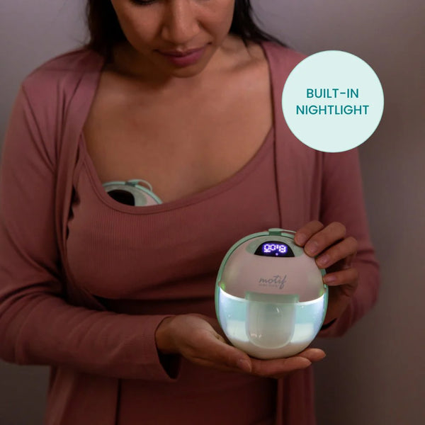 Motif Aura Glow Wearable Breast Pump in angle 6 view, showcasing its sleek design and portability for breastfeeding moms.