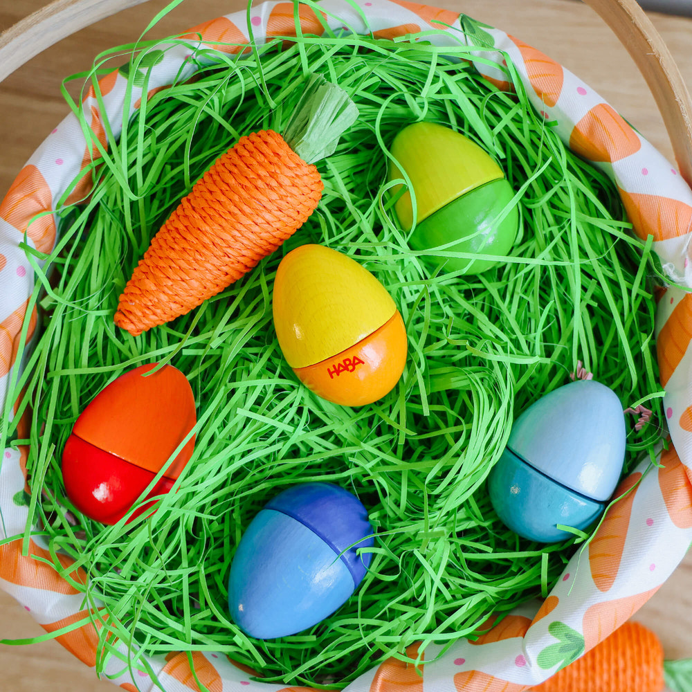 Colorful Fun with Sounds Wooden Eggs for babies, promoting musical play and sensory exploration.