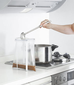 Collapsible steel bottle dryer at angle 6, perfect for efficient drying of baby bottles and accessories.