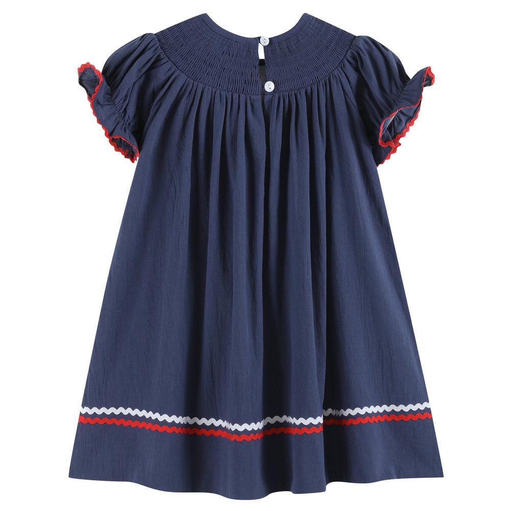 Navy blue Santa smocked bishop dress for babies, perfect for holiday celebrations and festive occasions.