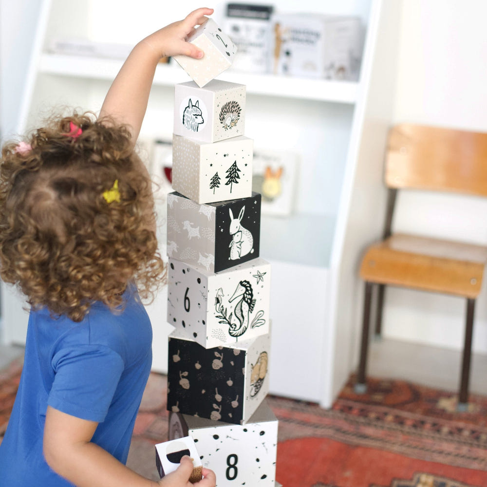 Nesting blocks featuring adorable baby animals, perfect for playful learning and development in infants.