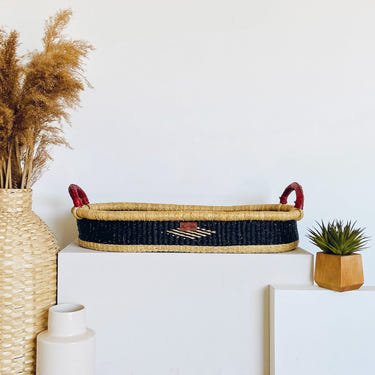 "Nightfall Changing Basket - Stylish and functional baby changing solution for nursery or on-the-go."