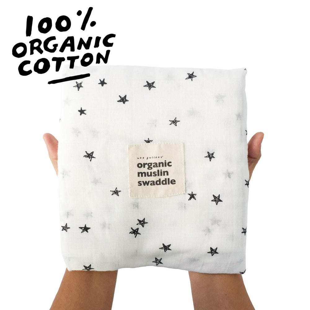 Organic Muslin Swaddle featuring a star pattern, perfect for wrapping your baby in comfort and style.