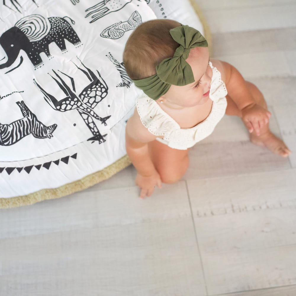 "Safari Playmat for babies, featuring colorful animal designs, perfect for playtime and tummy time."