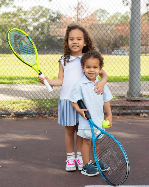 PLAY+ Girls Dionis Tennis Dress in angle 5 view, perfect for active girls' play and stylish summer outings.